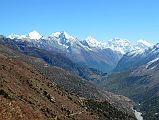 13 Looking Back Towards Manang With Kang Guru, Pisang Peak, Manaslu, Ngadi Chuli and Himalchuli Above On Trek From Tilicho Peak Hotel To Tilicho Tal Lake 